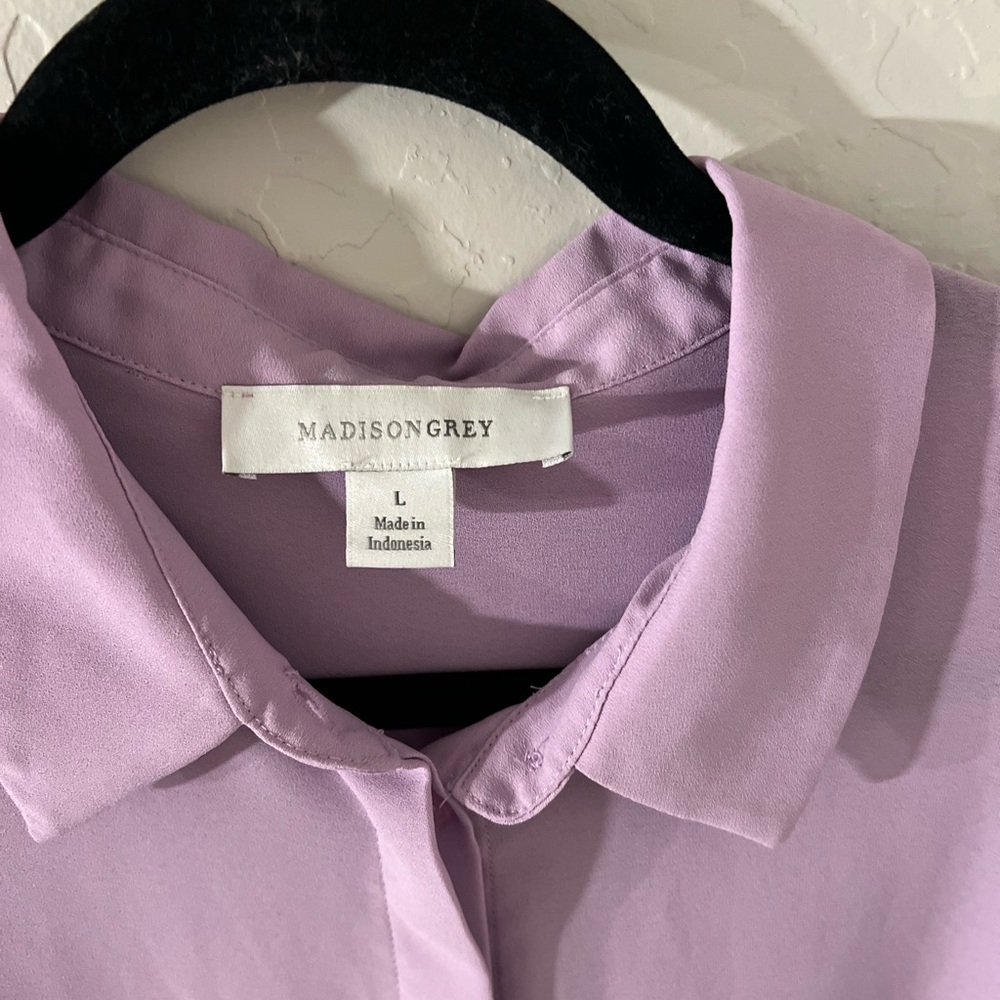 A little sheer lavender color blouse is like a purple pink color - Picture 3 of 4